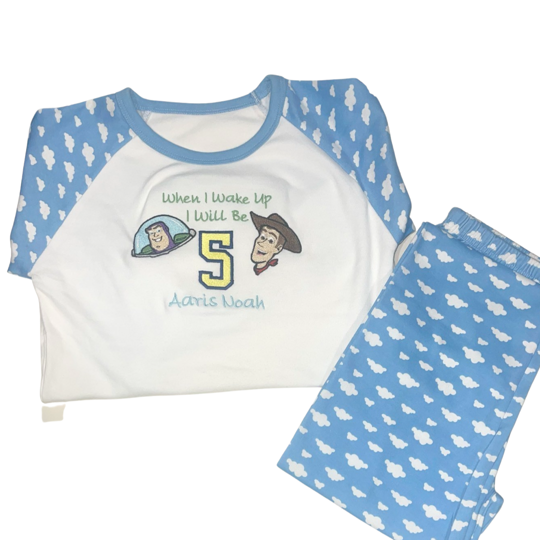 When I wake up I will be (number), cowboy and spaceman pyjamas